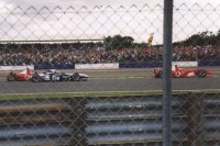 Rubens Barrichello - Ferrari followed by Michael Schumacher - Ferrari & Ralf Schumacher - Williams BMW